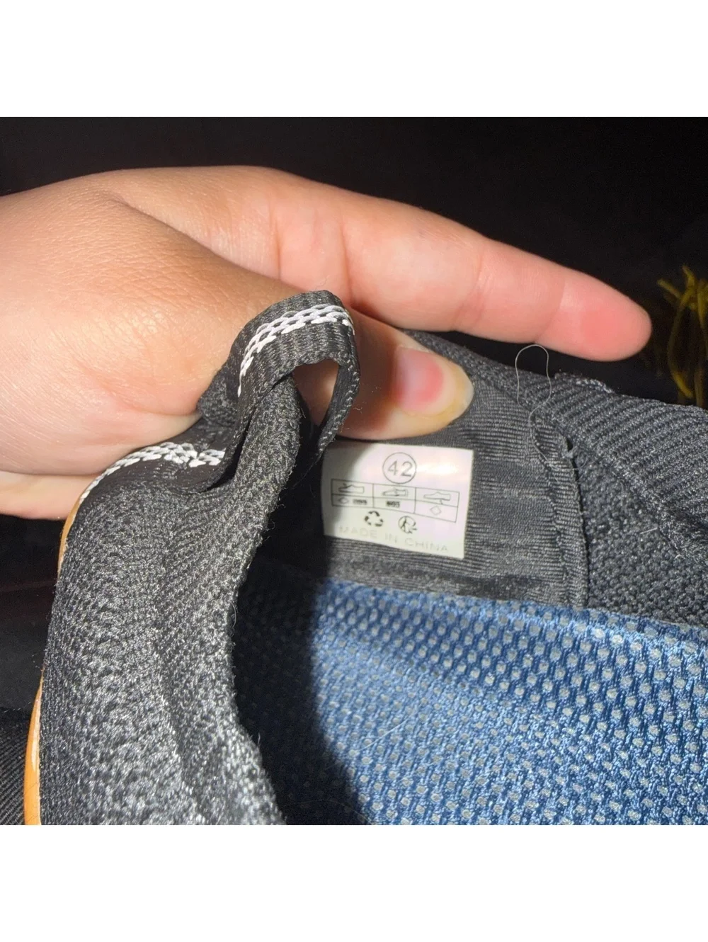 Black Knit Sneakers with Orange Soles and Yellow-Orange Lany